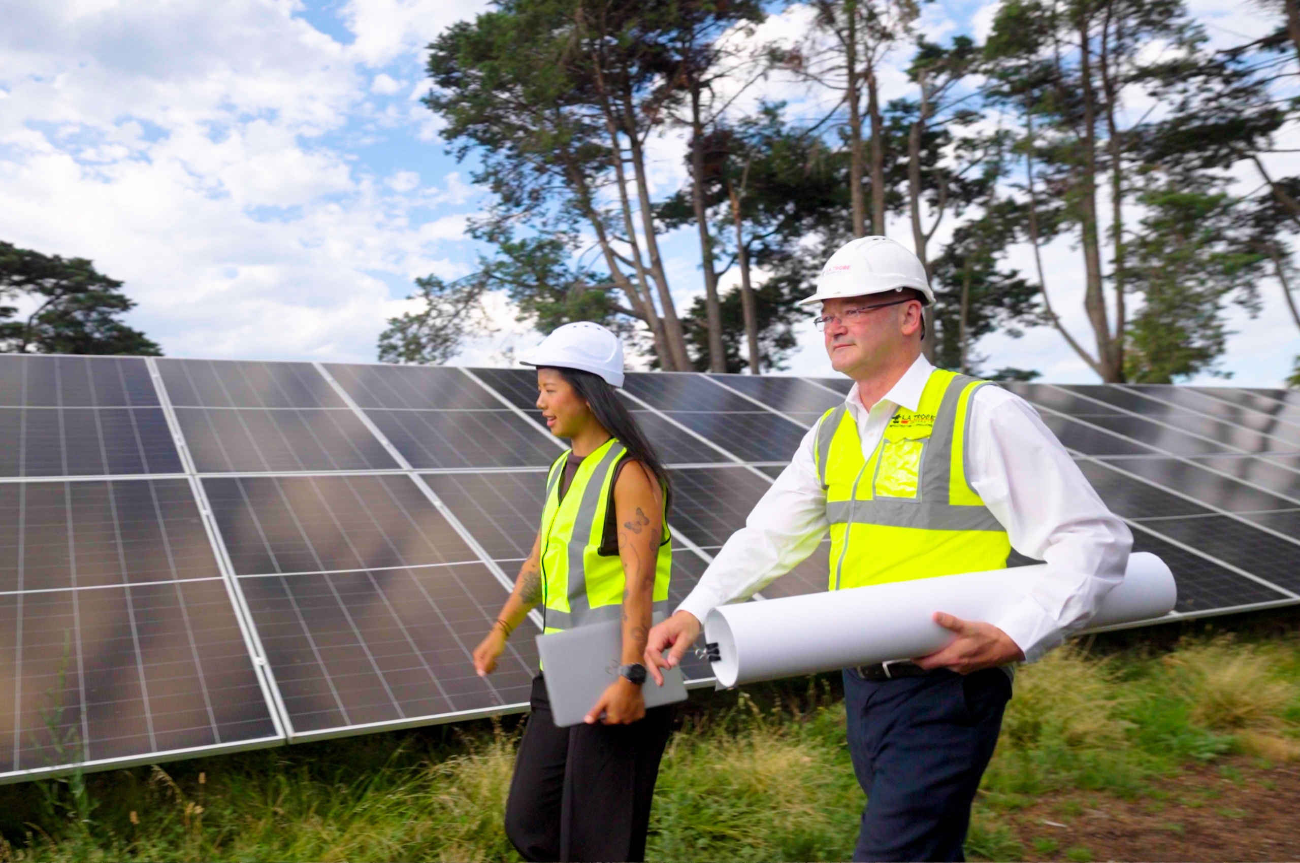 Net Zero Executive Director Andrew Jennings and Environmental Management System Advisor Xiao Yan Li.