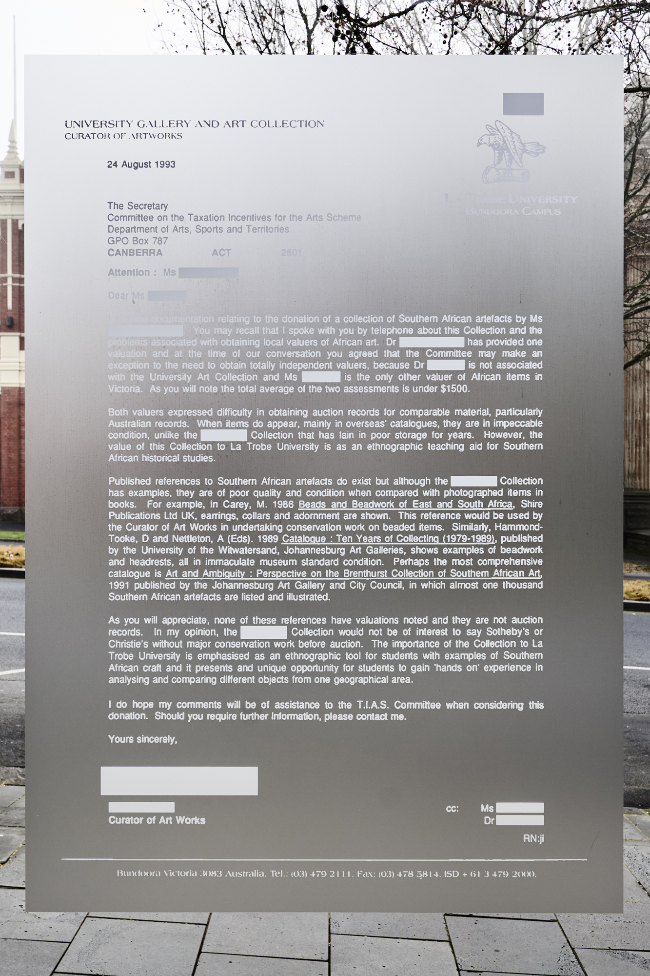 photograph of installation on glass facade of La Trobe Art Institute