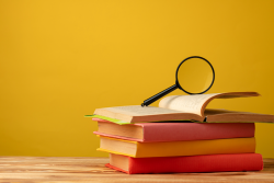 Search - books and magnifying glass