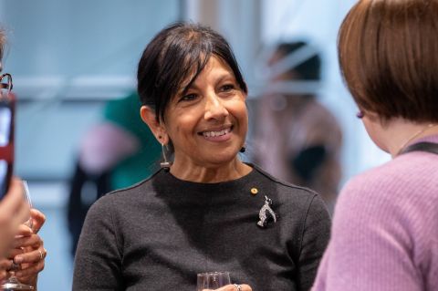 Woman smiling warmly